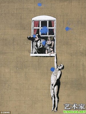 英国著名涂鸦艺术家班克斯壁画遭彩枪污损